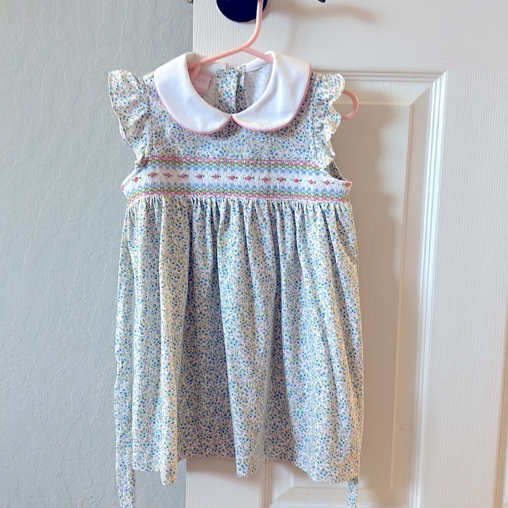 Petite Bébé hand smocked floral dress.